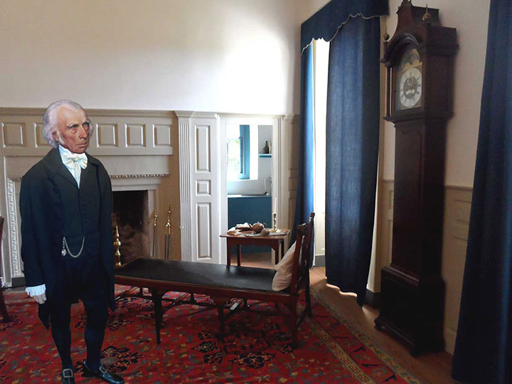 James Madison in Nelly Madison's room looking at his father's clock.