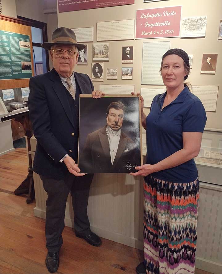 Bruce Daws accepting the life mask of Marquis de Lafayette